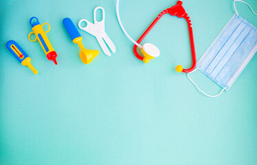 Toy medical devices on a blue background. Kids medical instruments. Children's doctor 
