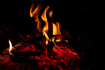 Flames of a bonfire at night
