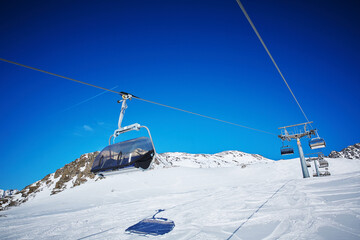 Fototapeta na wymiar empty ski lift in the mountains