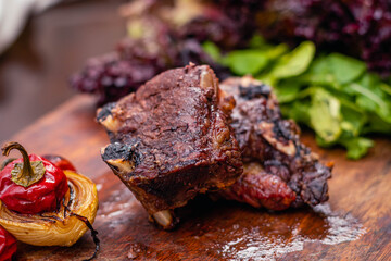 roast beef cut beef rib with pepper onion and arugula salad and lettuce