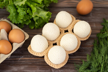 Happy easter. Knitted easter egg.  Concept. Stylization. Needlework. Environmentally friendly toys for children to develop fine motor skills. Hand made toys. 