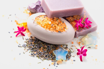 Natural handmade soap, dried lavender flowers, amethyst and moonstone crystal. Items for spa care and healing treatments with copy space