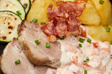 meat with vegetables and sauce