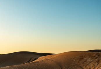 Fototapeta na wymiar Beautiful sand dunes at sunset