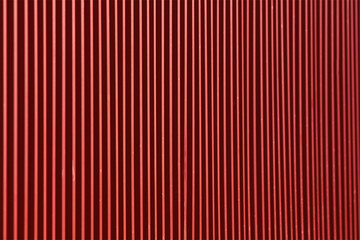 Textur rot metallic. Linien und Streifen in Bewegung. Optische Täuschung	
