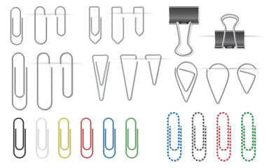 Set of metal paper clips isolated on white background attached to paper