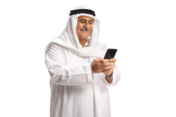 Mature arab man smiling and using a mobile phone