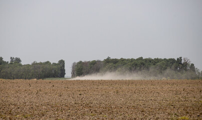 Dry ploughed fields in Arkansas summer, dustry