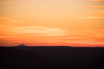 Fototapeta premium Colorful sunset over the mountain hills. Beautiful landscape in Azerbaijan nature.