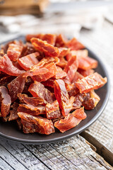 Dried chicken meat. Tasty jerky meat.