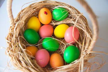 Easter pattern of Eggs with flowers and candies on the white background. Easter concept. Healthy feeding concept.