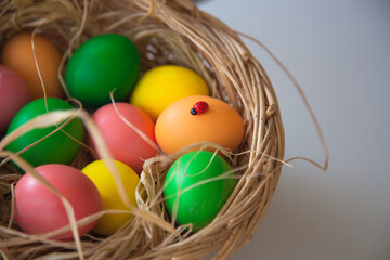 Easter pattern of Eggs with flowers and candies on the white background. Easter concept. Healthy feeding concept.
