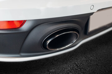 Obraz na płótnie Canvas Modern and luxury sports car exhaust system pipes