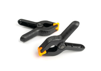 Obraz premium Construction Clamp Isolated, Black Plastic Clip for Carpentry