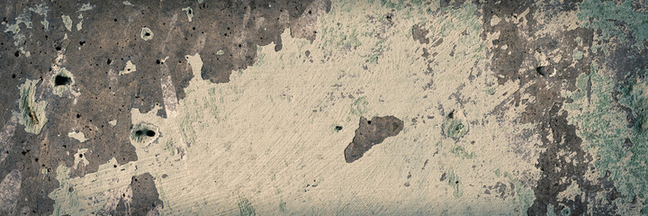 Old wall with cracked stucco. Weathered rough surface. Wide panoramic texture for background and design.
