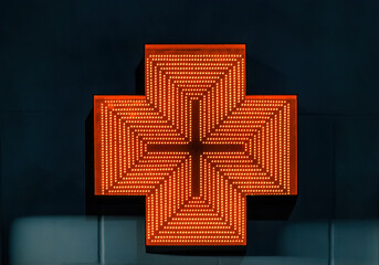 Pharmacy emblem. Red shining electric cross