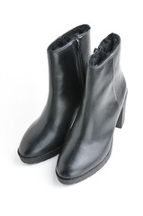 Leather female ankle boots on a white background