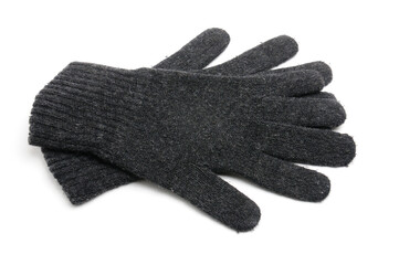 Winter knitted woolen gloves on a white background
