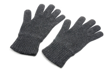 Winter knitted woolen gloves on a white background