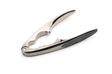 Tongs for nuts on a white background