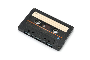 Vintage compact audio cassette on white background