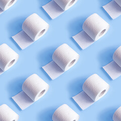 White toilet paper roll repeat seamless pattern on light blue background. - 420333949