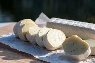 Belgian abbey cheese fagotin in pieces with jam served outdoor, Wallonia, Belgium