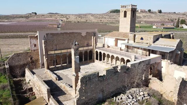 View from drone of ancient ruined monastery of Avinganya near Catalan city of Seros on spring sunny day, Spain