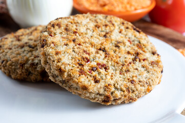 Tasty vegetarian food, burgers made from orange lentils legumes with sun dried tomatoes