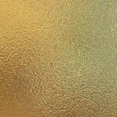 Gold foil paper texture background.