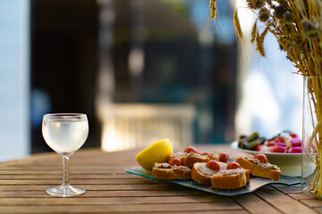 Breakfast on the table in the yard in the summertime