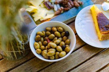 Breakfast on the table in the yard in the summertime