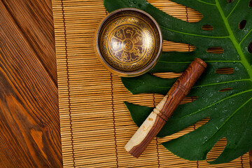 Tibetan singing bowl. Tibetian inscription - mantra 