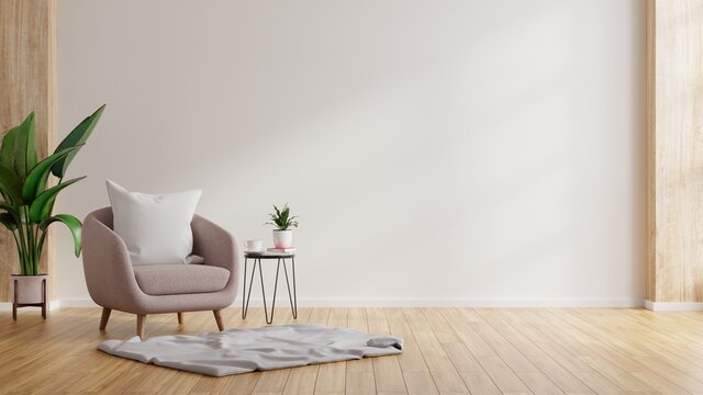 Modern minimalist interior with an armchair on empty white wall background.