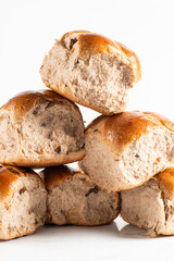 Fresh baked traditional Easter hot cross buns with raisins.