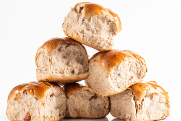 Fresh baked traditional Easter hot cross buns with raisins.