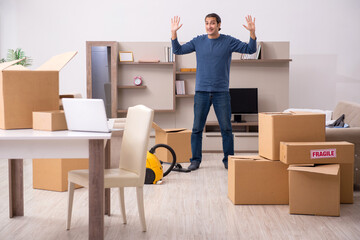 Young man moving to new flat