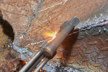 Top View Oxygen Acetylene Cutting Torch and Sparkle and Molten Metal