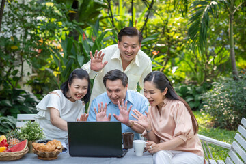 Fototapeta na wymiar Group of asia family and friends happiness meeting, Lifestyle people middle age outdoor party. Communication social online life of asian people.