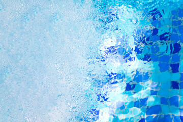 Air bubbles in clear blue water in pool for backgrounds.