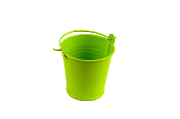 Empty green metal bucket on a white background.