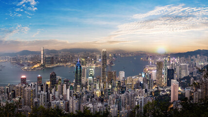 Fototapeta na wymiar Panorama view of Hong Kong skyline on the evening seen from Victoria peak, Hong Kong, China.