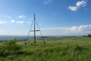 Countryside landscape view from the top of the hill. Panorama of the plains. Triangulation point.