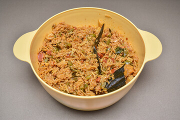 homemade Veg biryani or veg pulav in bowl , Fried rice indian food on kitchen platform