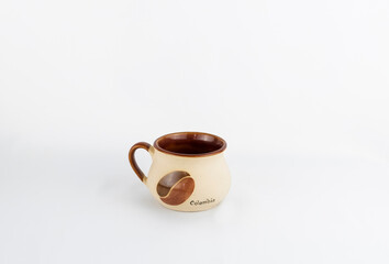 Closeup of a craft of a cup of colombian coffee on white background