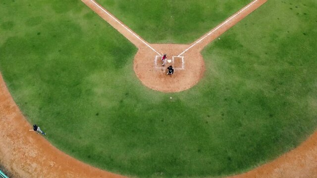 San pedro de macoris, DR - March 12, 2021 - top view of young Kids practicing baseball at stadium in san pedro de macoris, open season training, dominican republic