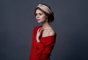 Fototapeta premium attractive woman red dress elegant style decoration studio gray background