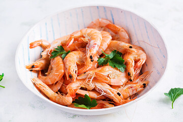 Prawns on bowl. Shrimps, prawns. Whole boiled shrimp. Seafood.