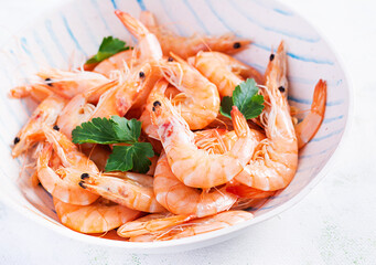 Prawns on bowl. Shrimps, prawns. Whole boiled shrimp. Seafood.