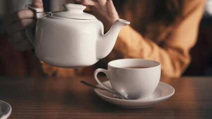 tea in a teapot mug on the table cafe breakfast How to rest